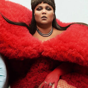 Lizzo for Vanity Fair Wearing the Saber Earrings and Sinewave Ring