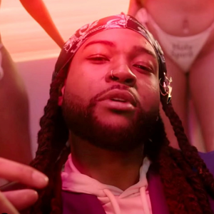 Partynextdoor wearing The Chain Cutlass earring for 'Excitement' Music video