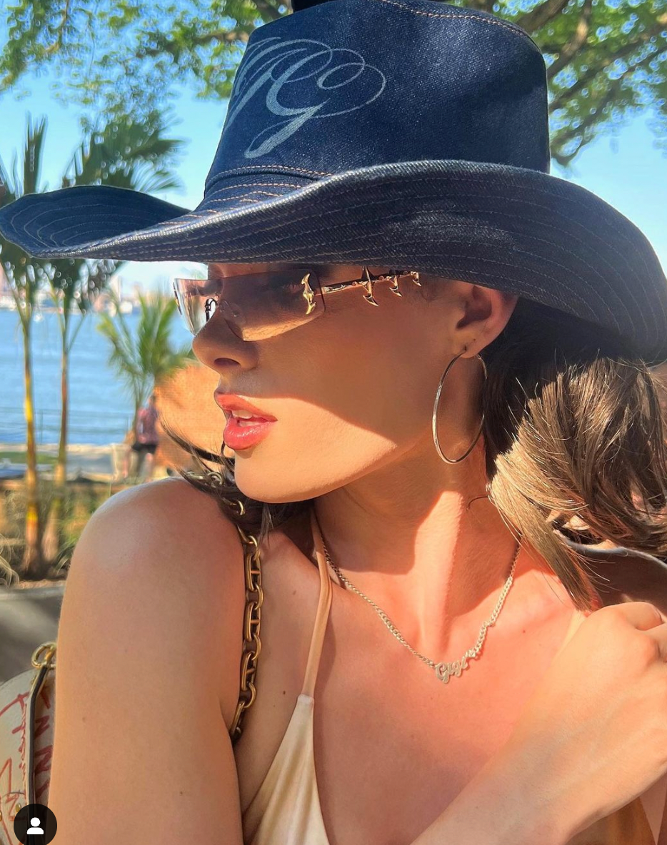 Gigi Goode wearing the Spinal Sunglasses