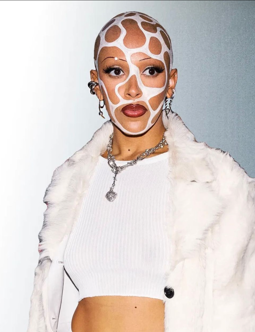 Doja Cat for NYFW Vogue World wearing the Fang Earring and Baby Claw Earring