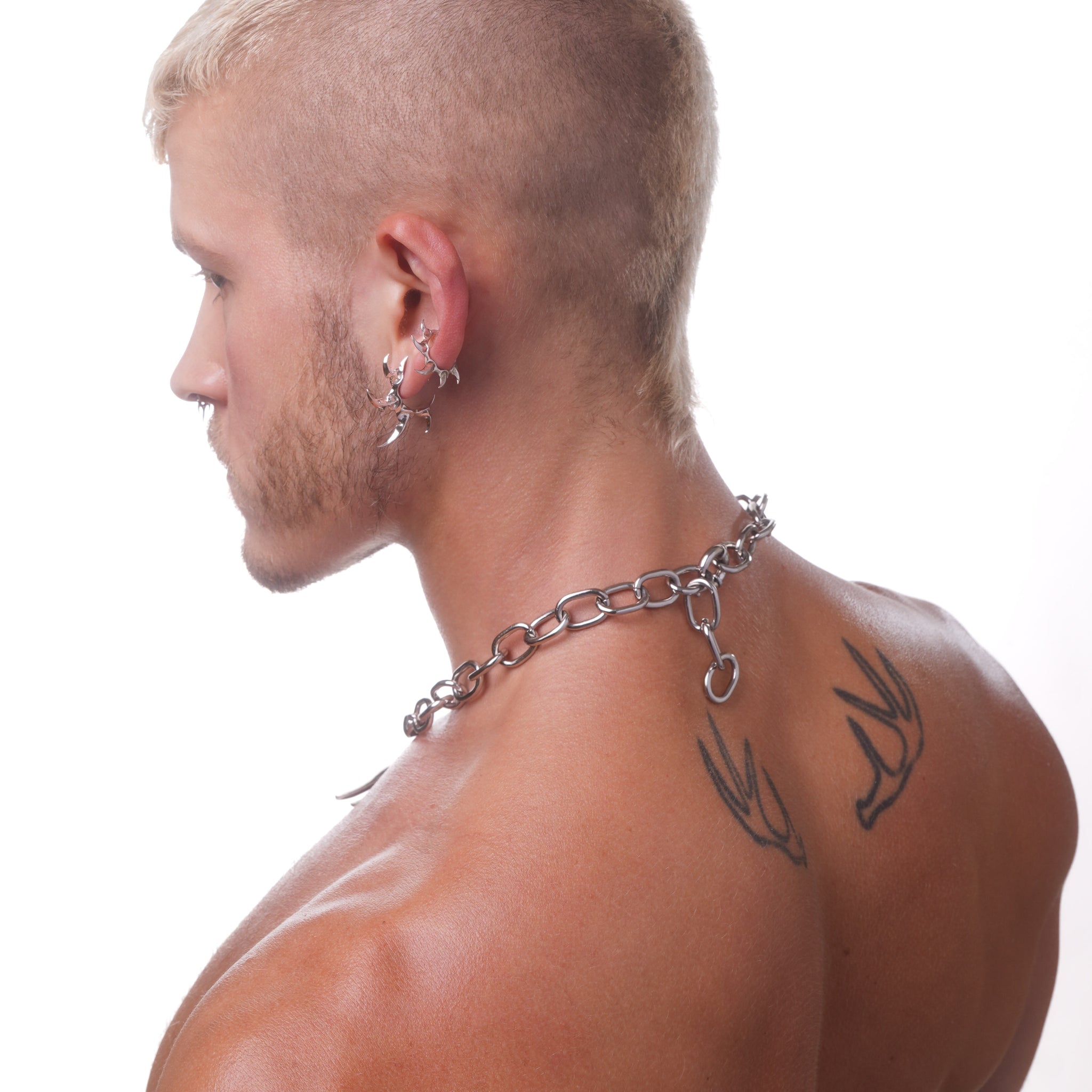 LARGE SPIRAL TOOTH EARRING